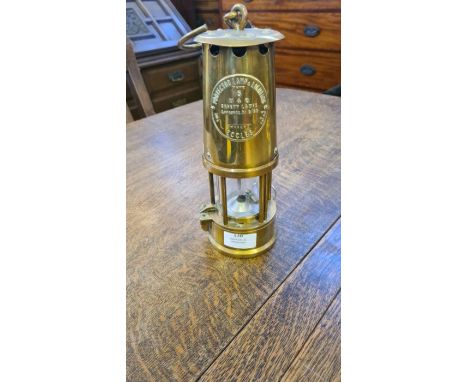 An Eccles type 6 brass miners lamp.