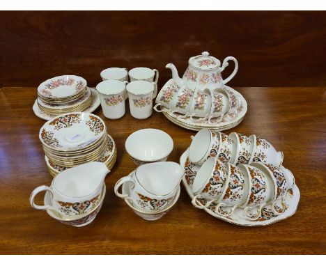 Colclough floral part tea service with teapot, 4 matching coffee cups and a brown and blue Colclough teaset.