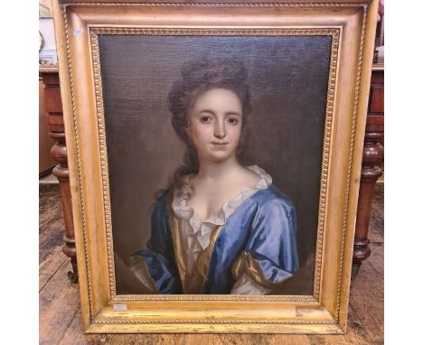 Thomas Murray (1663-1735).  Portrait of a lady, half length, in a blue and yellow gown, feigned oval.  Oil on canvas 27" x 22