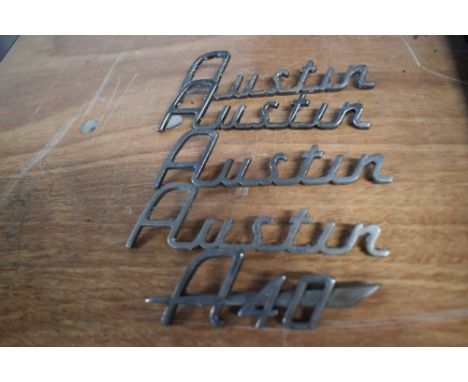 Five vintage car bonnet/ boot name badges, of Austin interest.