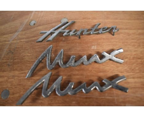Three vintage car bonnet/ boot name badges, of Hillman interest.
