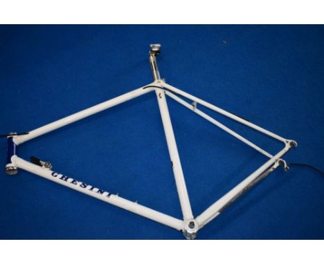 A Vintage Chesini Cronometro SL/SLX steel bike frame, in original white paint work, chrome forks and Vintage Chesini jersey. 