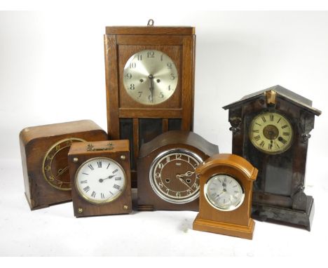 Four boxes of mid 20th Century and later manual wind and Quartz mantel and wall clocks.  (4) 