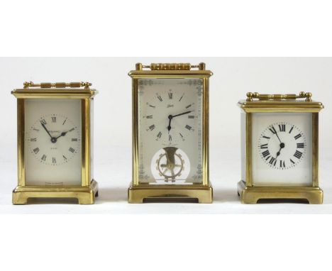 A Bayard 8 day carriage clock with French movement, together with a Schatz German 8 day carriage clock and an un-named exampl