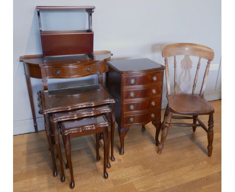 A mahogany serpentine four height chest of drawers, together with a nest of three tables, a mahogany console table, a trypod 