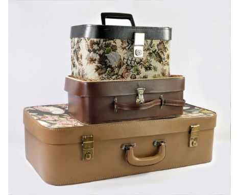 A mid 20th century suitcase, with bird and floral fabric decoration with fabric lined interior, 61cm x 38cm x 17cm, together 