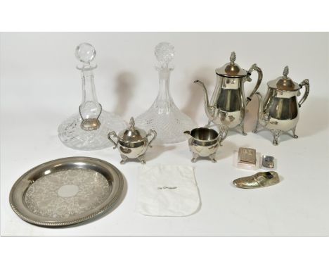 A silver plated four piece coffee/tea service, together with a pair of cut glass ships decanters, hobnail design with frosted