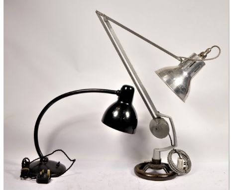 An early 20th Century anglepoise lamp, on cast iron wheel base, together with a painted cast metal reading light. (2) 