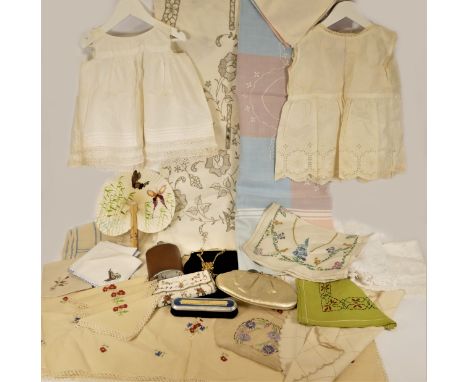 A large embroidered tablecloth, other tablecloths, napkins and various linens, a clothes brush for manufacturers Maurice Dixo