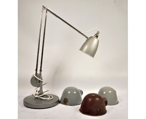 A Padrill of London anglepoise lamp c1930s, together with three enamelled Crompton lamp shades. (4) 