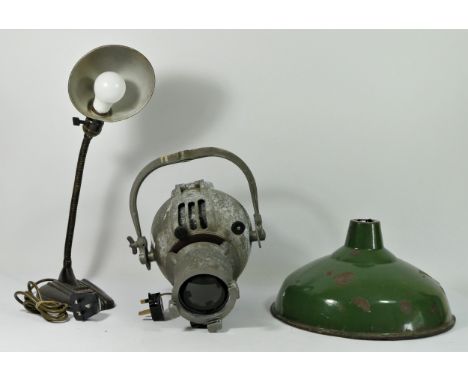 A 'Strand Electric' industrial theatre studio spot light, c1950s, together with a 1930s cast iron gooseneck desk lamp and a 1