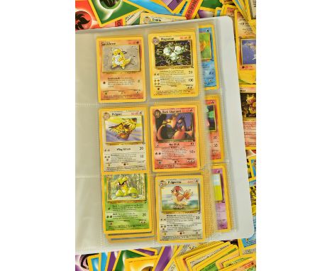 AN ASSORTMENT OF OVER THREE HUNDRED POKEMON CARDS, from the Base Set, Base Set 2, Jungle, Fossil and Team Rocket sets; all co