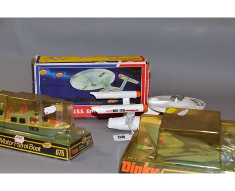 A BOXED DINKY TOYS STAR TREK U.S.S. ENTERPRISE, No.358, complete with five photon projector missiles and shuttlecraft, appear