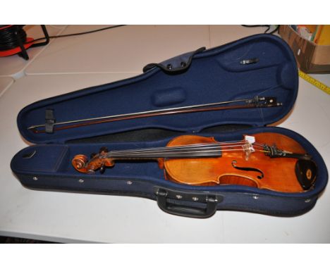 A CASED VIOLIN  with internal paper label stating Antonius Stradivarius Cremonensis, Facebat Anno 1721 total length 59cm  wit