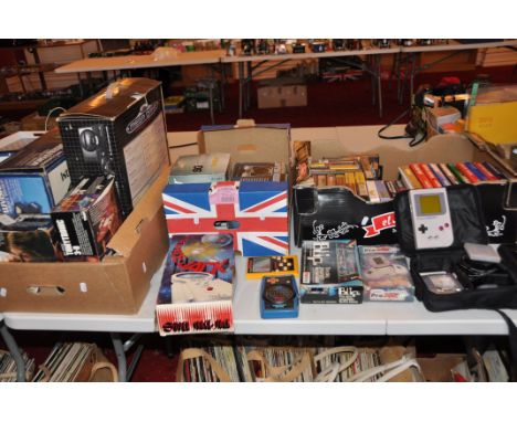 THREE TRAYS CONTAINING VINTAGE GAMING CONSOLES including a boxed Grandstand Astro Wars, a Tomytronic 3D sky attack in red wit