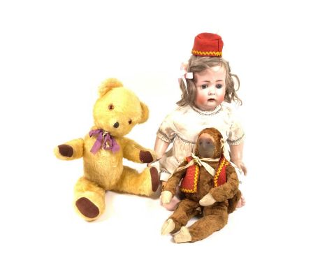 A CHILTERN HYGIENIC TOY MONKEY,  EARLY 20TH CENTURY (3)30cm high, a German bisque head doll and a Pedigree Teddy bear, 37cm h