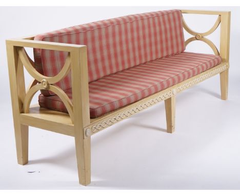 A MODERN YELLOW PAINTED OPEN X-FRAME HALL SEAT OR SOFA210cm wide; 60cm deep; 84cm high