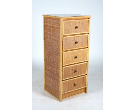 A MODERN RATTAN AND FAUX BAMBOO TALL CHESTWith inset glass top over five short drawers, 48cm wide; 111cm highThe top is fitte