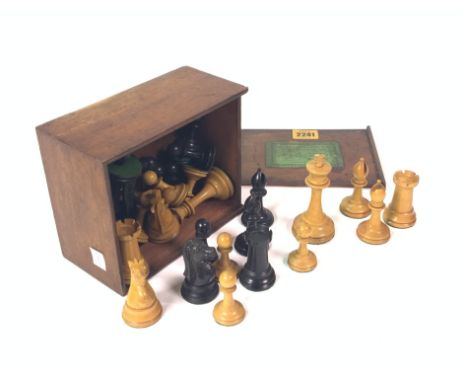 A BOXED SET OF 19TH CENTURY CHESS PIECESCondition Report;Black King weight 31.8 gms, White King weight 22 gms. There are 32 p