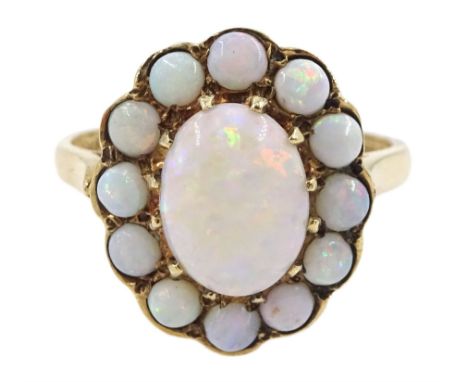 9ct gold oval and round opal cluster ring, hallmarked, central opal approx 1.00 carat