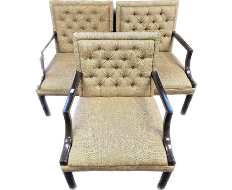Set of three 19th Century button back armchairs covered in a neutral upholstery raised on square legs 