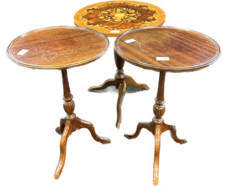 Three antique wine tables raised on tripod bases 