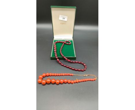 Vintage cherry amber graduating bread necklace. Together with a vintage orange glass bead necklace. [Amber-33.40grams] 
