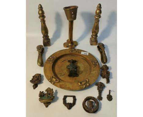 Collection of brass ware; vintage brass door knockers, art nouveau plate &amp; pair of brass moon faced nut crackers 