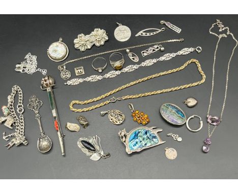 A Collection of silver jewellery; Silver kilt pin, Various unusual brooches, Opal and tiger eye stone rings, Two tone silver 