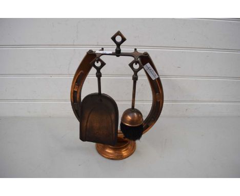 COPPER FIRE TOOL STAND FORMED AS A HORSESHOE