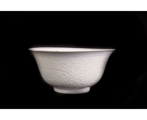 A white glazed porcelain bowl bearing a Kangxi incense burner mark within double circle at the baseChina, Qing dynasty, Kangx