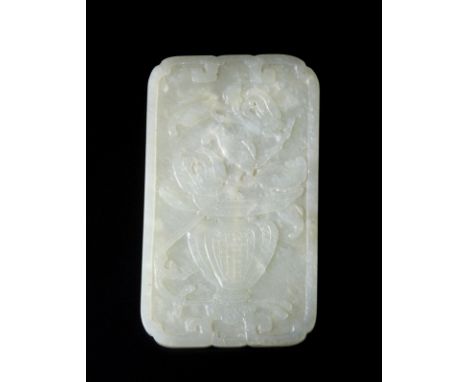 A pale jade plaque carved with flower pot China, Qing dynasty, 19th century   Cm 6,50 x 11,50