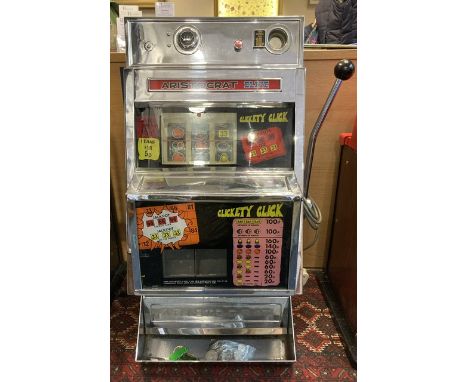 Aristocrat: An Aristocrat Elite, operating on old ten pence play, one arm bandit, vintage coin operated amusement slot machin