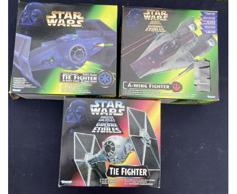 Star Wars: A collection of three boxed Kenner, Star Wars vehicles to include: Tie Fighter, A-Wing Fighter, and Darth Vader&rs