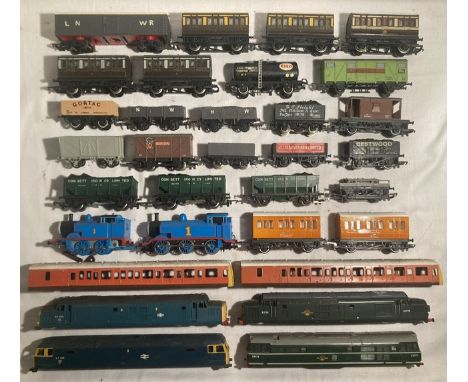 Railway: A collection of assorted OO gauge trucks along with Thomas the Tank Engine with two coaches and six diesel locomotiv