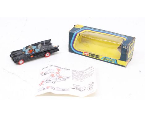 Corgi: A boxed Corgi Toys, Rocket Firing Batmobile, 267. Original box with Operating Instructions. Batman figure present with