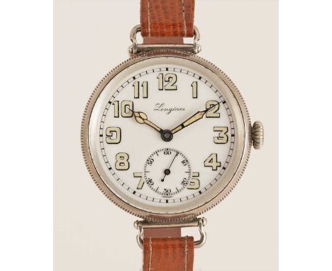 A GENTLEMAN'S SOLID SILVER LONGINES OFFICERS TRENCH WRIST WATCHCIRCA 1916, WITH WHITE ENAMEL DIALMovement: 15J, manual wind, 