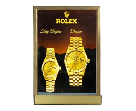 A RARE ILLUMINATING ROLEX DATEJUST ADVERTISING SHOP SIGNCIRCA 1980s Measures approx. 47cm by 32cm. CONDITION REPORTOverall th