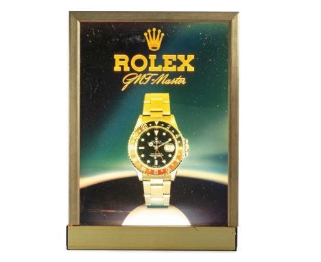 A RARE ILLUMINATING ROLEX GMT MASTER II ADVERTISING SHOP SIGNCIRCA 1980s Measures approx. 45cm by 32cm. CONDITION REPORTOvera