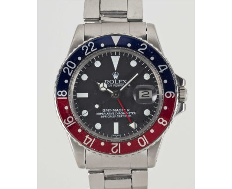 A GENTLEMAN'S STAINLESS STEEL ROLEX OYSTER PERPETUAL DATE GMT MASTER "PEPSI" BRACELET WATCHCIRCA 1973, REF. 1675 WITH ROLEX S
