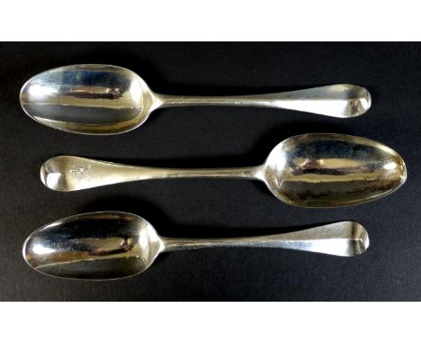 A collection of three George II silver Hanoverian pattern table spoons, comprising one by Samuel Roby, London 1746, 21cm, one