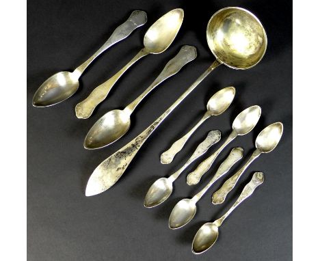 A group of German silver spoons, late 19th century, comprising a ladle, 5.75toz, 35cm long, and a set of three tablespoons, 7