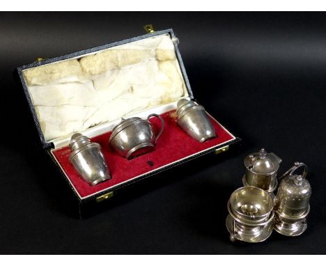 Two silver cruet sets, a Victorian silver set with pepper salt, mustard and pepper pot with trefoil form stand, Horace Woodwa