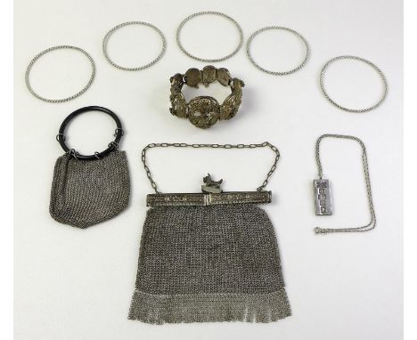 A group of silver and white metal jewellery, comprising a silver ingot pendant, 3.5cm, on silver chain, a Maltese silver gilt