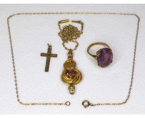 A Victorian 15ct gold pendant necklace, of scrolled design set to the centre with two garnets below a chased leaf, and an aqu