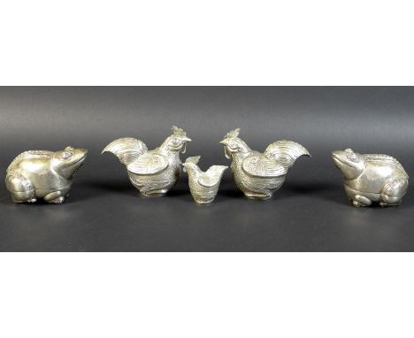 A group of five Cambodian Khmer silver zoomorphic trinket or Betel nut boxes, comprising a pair of boxes formed as frogs, a p