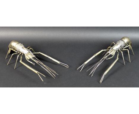 A pair of South East Asian white metal prawns, likely Cambodian Khmer silver, possibly by Sok Leng of Kampong Luong province 