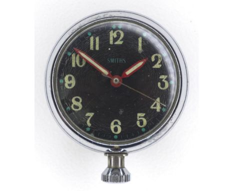 A vintage Smiths 'Motor' watch, dashboard clock, circa 1960, with manual wind movement and crown at 6 o'clock, chrome finish 