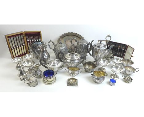 A collection of silver plated wares, including a Victorian egg cup stand with six egg cups, 20cm diameter,25cm high, a teapot