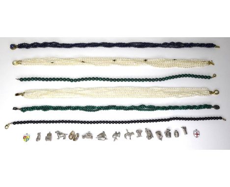 A group of six beaded necklaces, comprising two freshwater pearl seven stranded chokers, one with garnets interspersed, both 